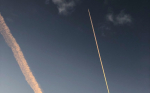 Contrails of an airplane up in the sky