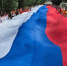 В День Государственного флага на дамбе Чернавского моста воронежцы развернули 100-метровый триколор - РИА Воронеж