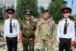 Почетный сотрудник Росгвардии принял участие в городских мероприятиях, посвященных Дню государственного флага